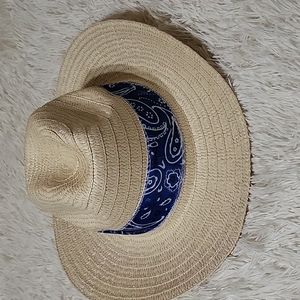 Never worn NWOT straw hat with Blue Bandana band.